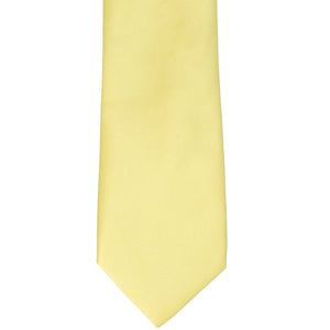 Front flat view of a light butter yellow solid tie