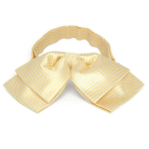 Front view of a light yellow and white chevron pattern floppy bow tie