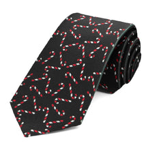 Load image into Gallery viewer, A black tie with a scattered candy cane print