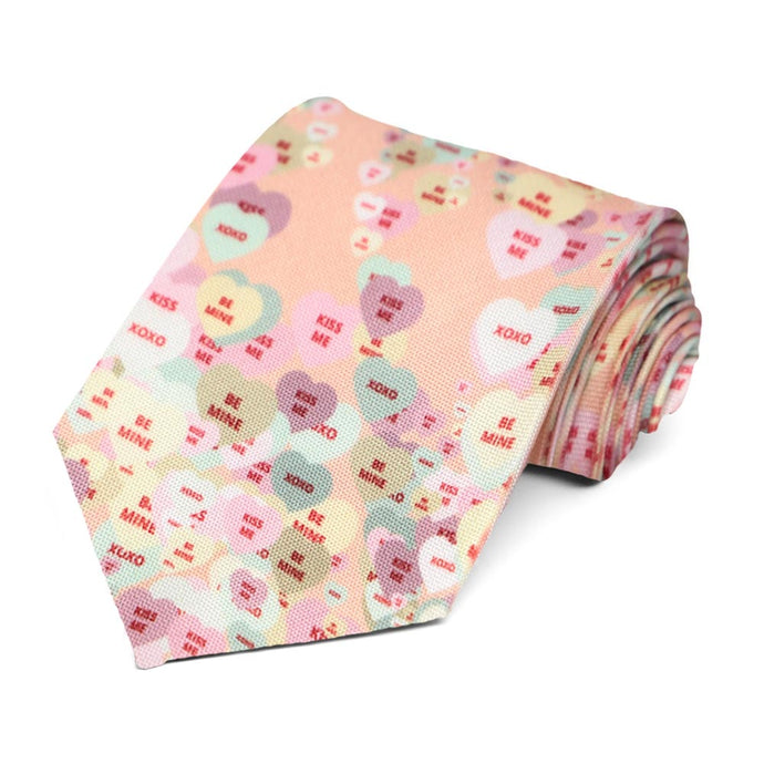 Peach and pink tie with Valentine's Day candy hearts design