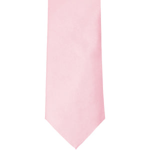 The front of a carnation pink solid tie, laid out flat