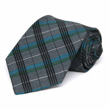 Load image into Gallery viewer, Dark gray necktie featuring a black, white , blue and green plaid pattern, rolled to show texture of fabric