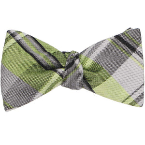 Green and gray plaid self-tie bow tie, tied