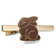 Load image into Gallery viewer, Chocolate bunny Easter tie bar on gold background.