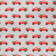 Load image into Gallery viewer, Closeup of a gray background pattern with red Christmas pickup trucks