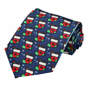 Red and green Christmas stockings on a dark blue novelty tie