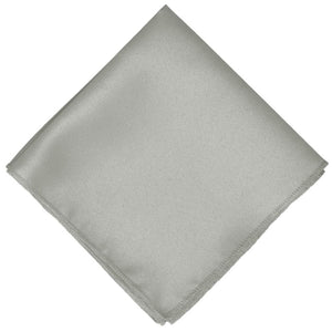 Solid color classic gray pocket square folded into a diamond shape