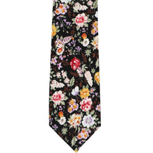 Load image into Gallery viewer, The front of a black, brown and subdued wildflower tie, laid flat