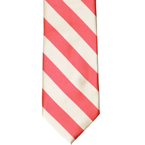 The front of a coral and Ivory striped tie, laid out flat