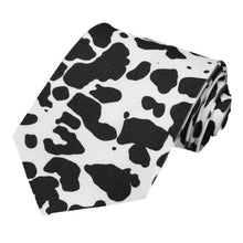 Load image into Gallery viewer, A one sided cow pattern tie in black and white.