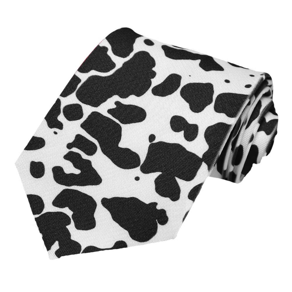A one sided cow pattern tie in black and white.