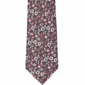 The front view of a crimson and white floral extra long tie