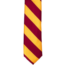 Load image into Gallery viewer, The front of a crimson red and golden yellow striped tie, laid out flat