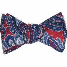 Load image into Gallery viewer, A crimson red paisley bow tie, tied