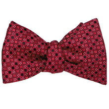 Load image into Gallery viewer, A crimson red self-tie bow tie, tied, in a square pattern