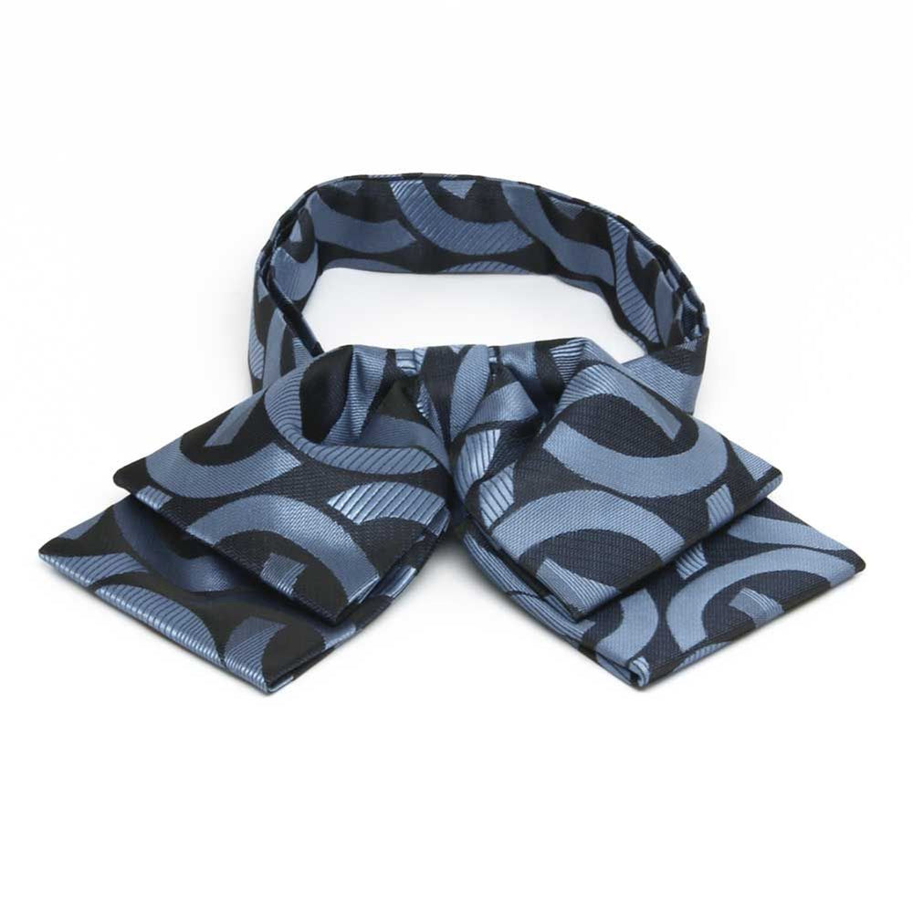 Blue and dark blue link pattern floppy bow tie, front view