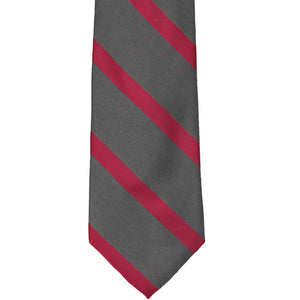 Front view of a dark gray and red extra long striped tie