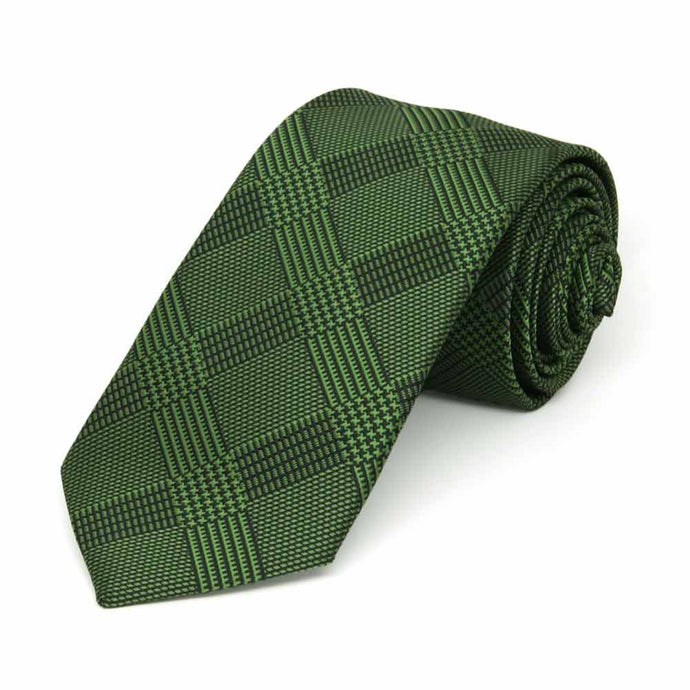 Dark green plaid slim necktie, rolled to show pattern