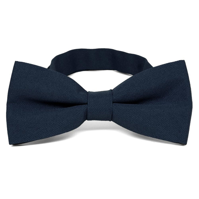 A dark navy blue matte finish bow tie