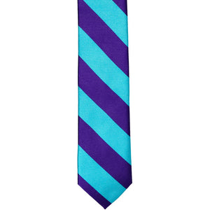 The front of a dark purple and turquoise striped tie, laid out flat