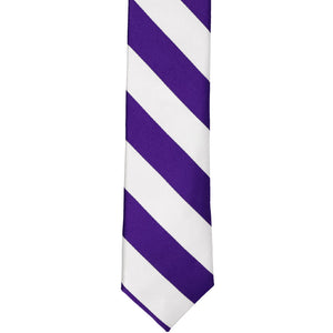 The front of a dark purple and white striped tie, laid out flat