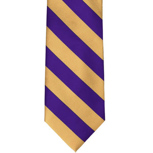 Front view of a dark purple and honey gold striped tie