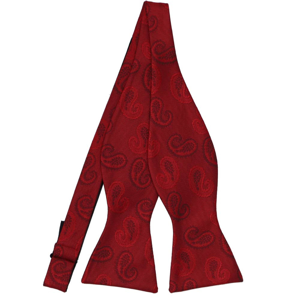 An untied tone-on-tone paisley self-tie bow tie in a dark red color