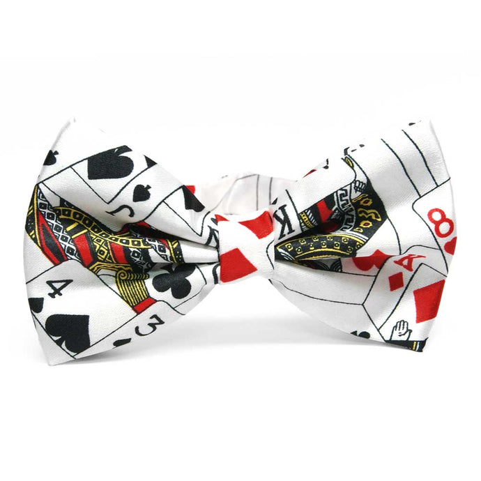 Playing cards spade, heart, diamond and clubs theme in a white bow tie.