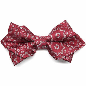 Front view of a red and white floral pattern diamond tip bow tie