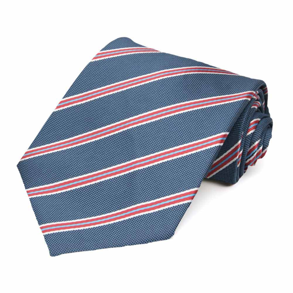 An extra long denim blue, red and white striped necktie, rolled view