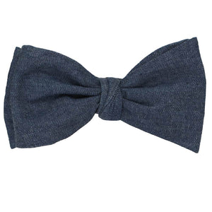 A denim self-tie bow tie, tied