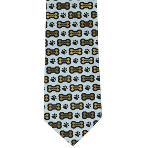 Blue necktie with dog bones and paw prints front view
