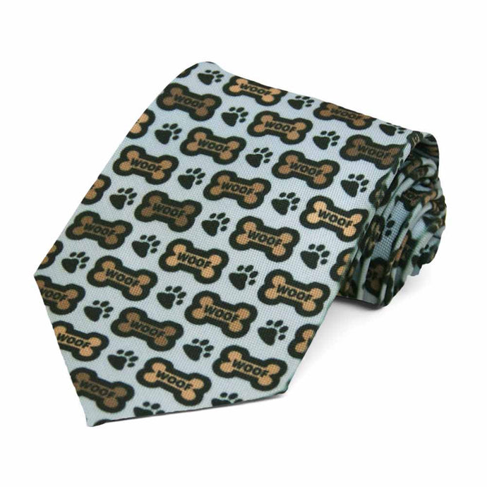 A dog bone and paw novelty tie in blue and brown