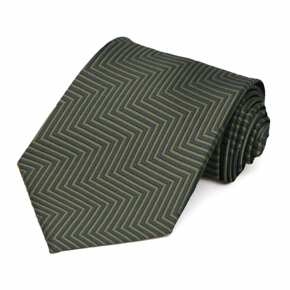 Rolled view of a dark green and sage green chevron pattern necktie