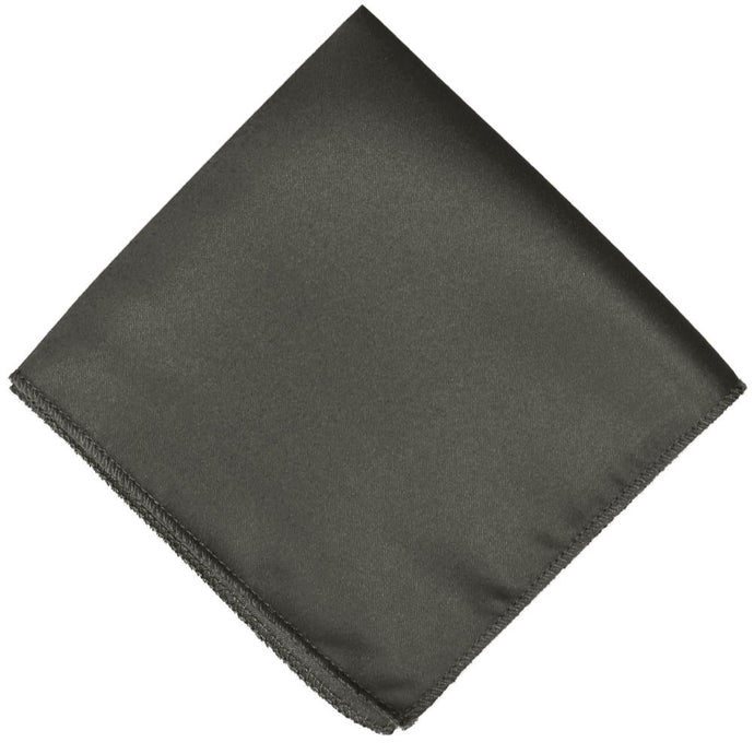 A dark gray pocket square, folded into a diamond shape