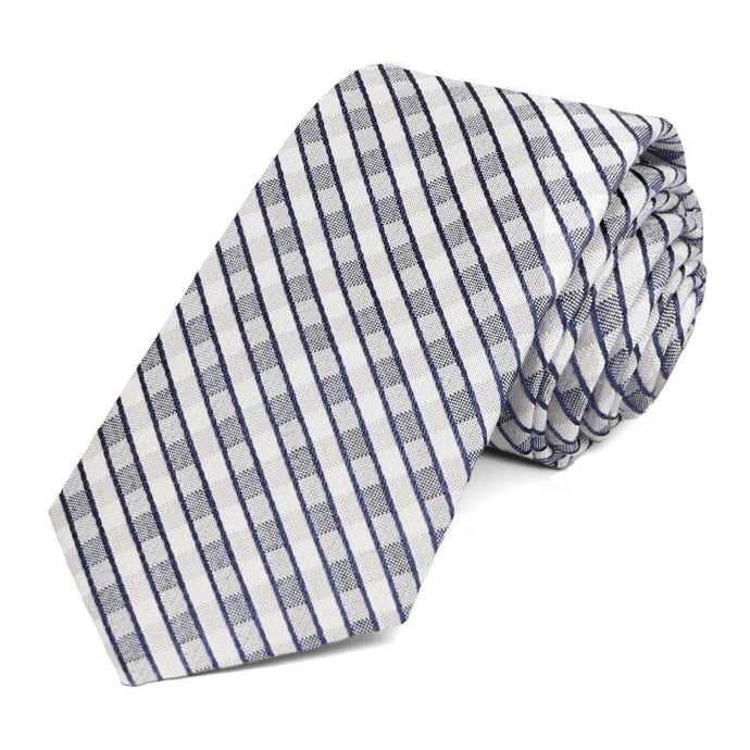 Dusty blue and white checked pattern necktie, roll to show woven texture
