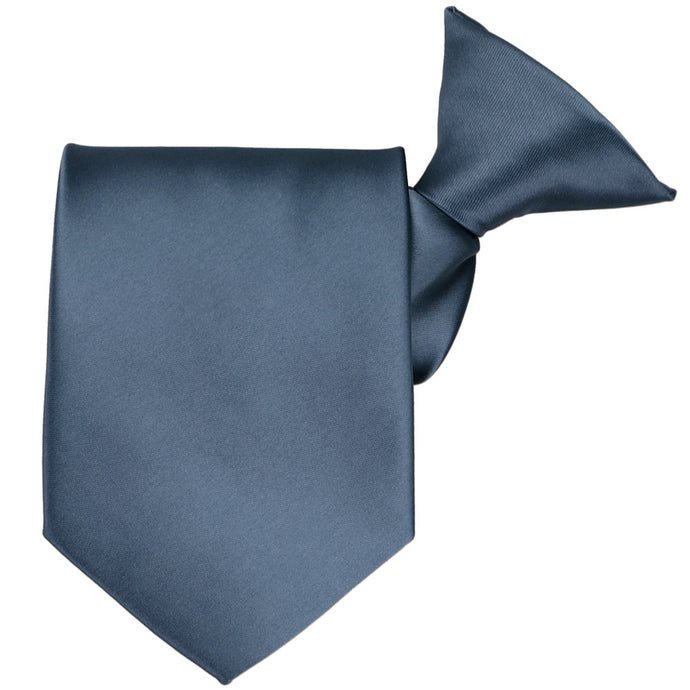 A dusty blue clip-on tie, folded to show the pre-tied knot and tie tip