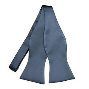 Dusty blue bow tie in a self-tie style