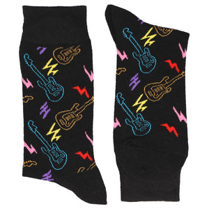Pair of men's neon electric guitar socks on a black background