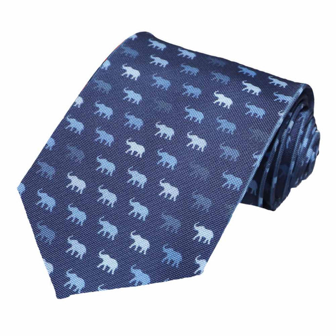 A tiled ombre elephant pattern on a dark blue tie.