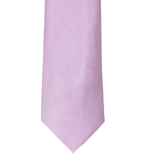 The front of an english lavender solid color tie, laid out flat