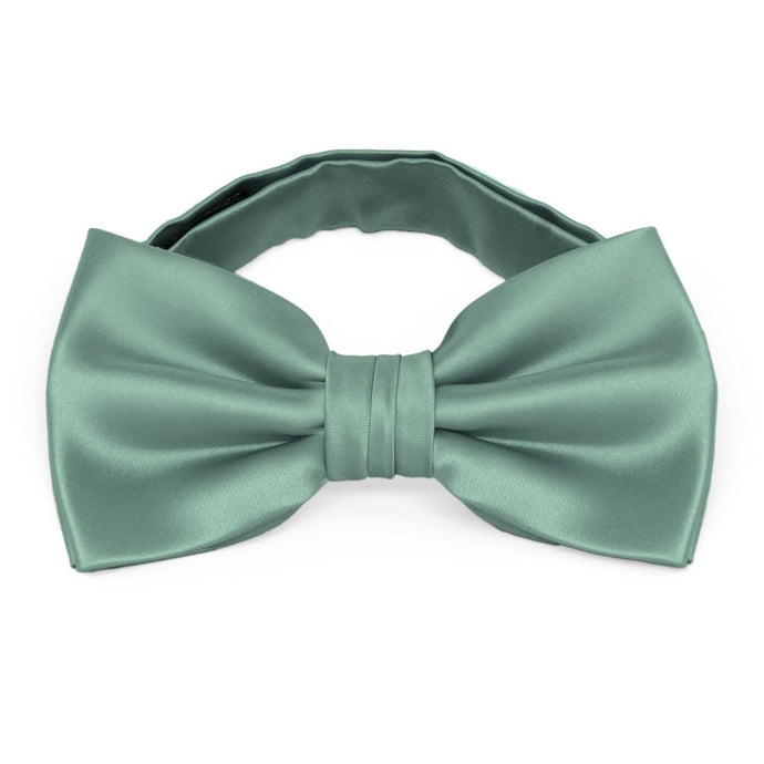 A pre-tied band collar bow tie in a eucalyptus green color