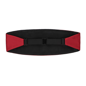 The back of a festive (dark) red cummerbund with a black elastic strap