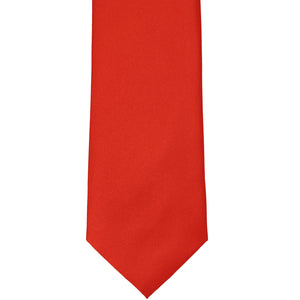 Front tip view of a bright red tie
