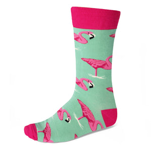 Men's pink tropical flamingo theme socks on seafoam green background