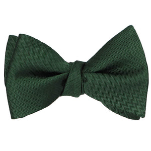 A tied herringbone tone-on-tone self-tie bow tie