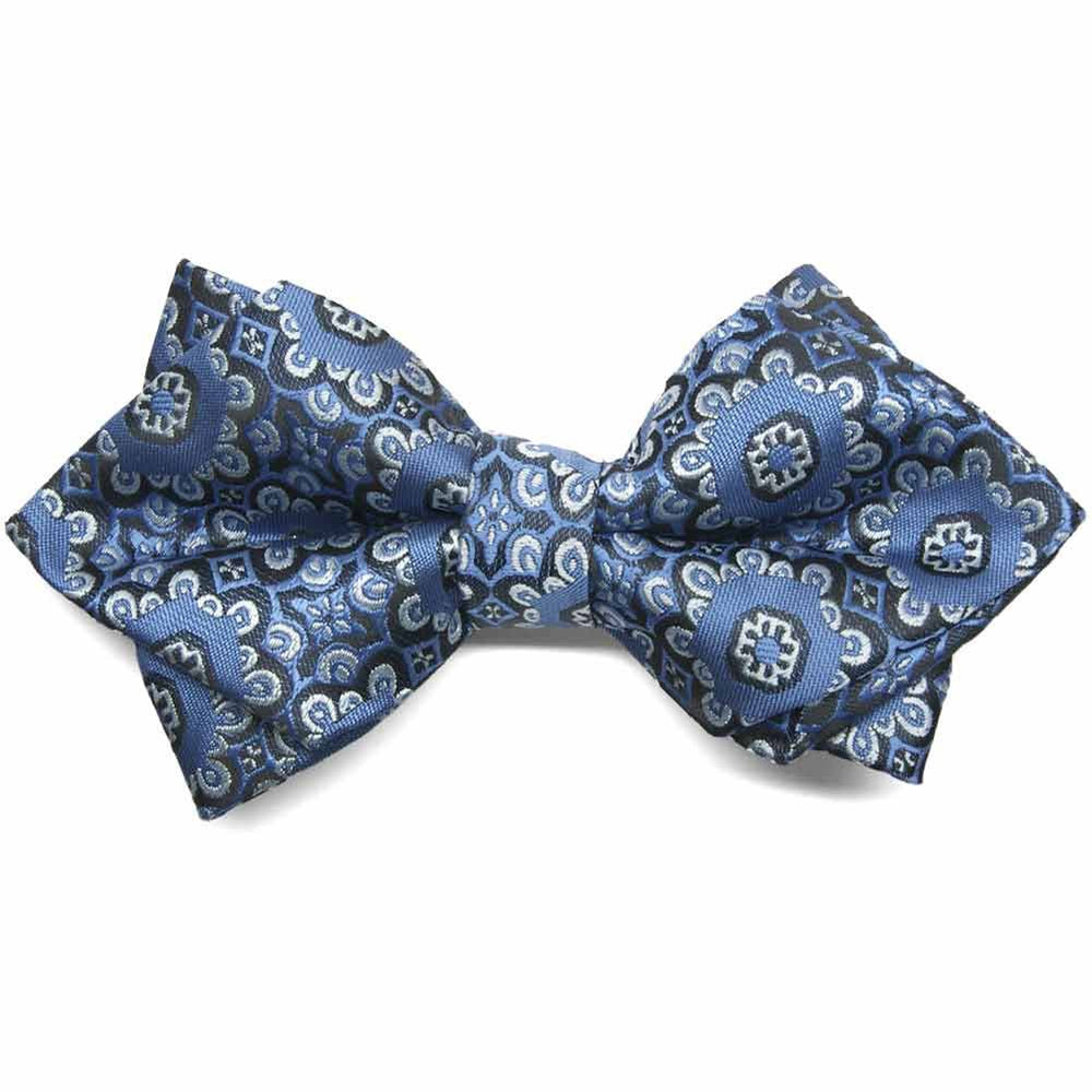 Front view of a diamond tip bow tie in a blue and white floral pattern