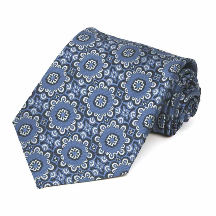 Rolled view of a blue and white floral pattern extra long necktie