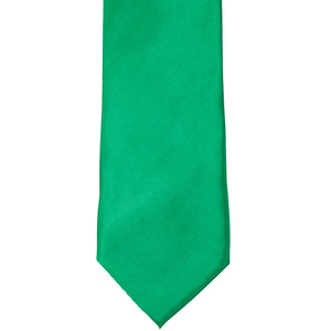 Front bottom view of a green solid tie