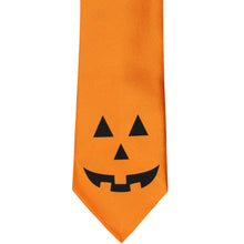 Load image into Gallery viewer, Orange tie with a jack-o-lantern face at the base of the tie